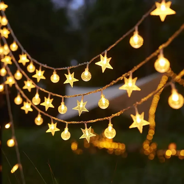 Guirnalda de luces estrellas y esferas