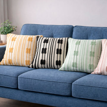 Cojín decorativo texturizado franjas tejidas