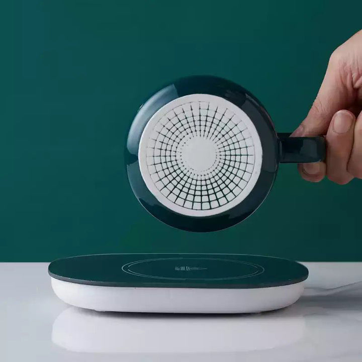 Taza con base calentador eléctrico